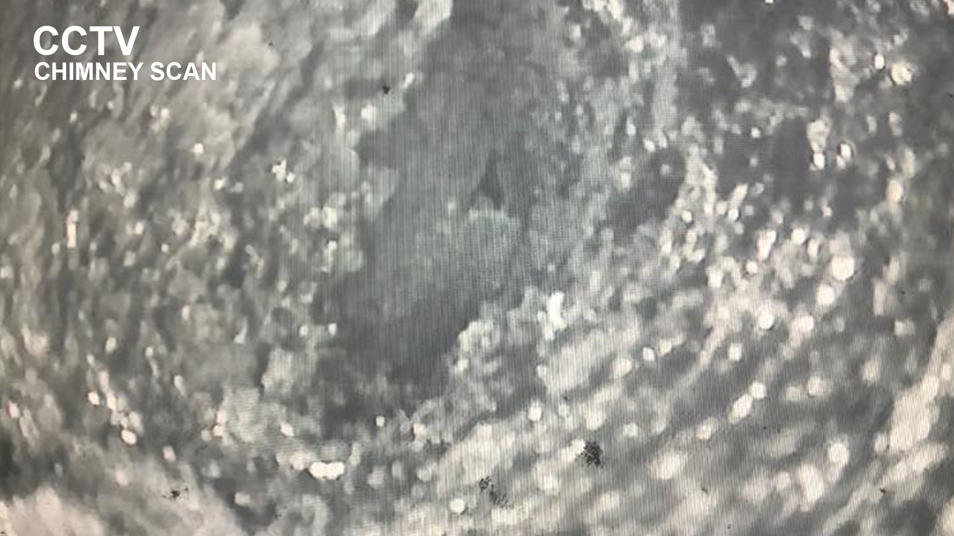 Unprepared fireplace with clutter